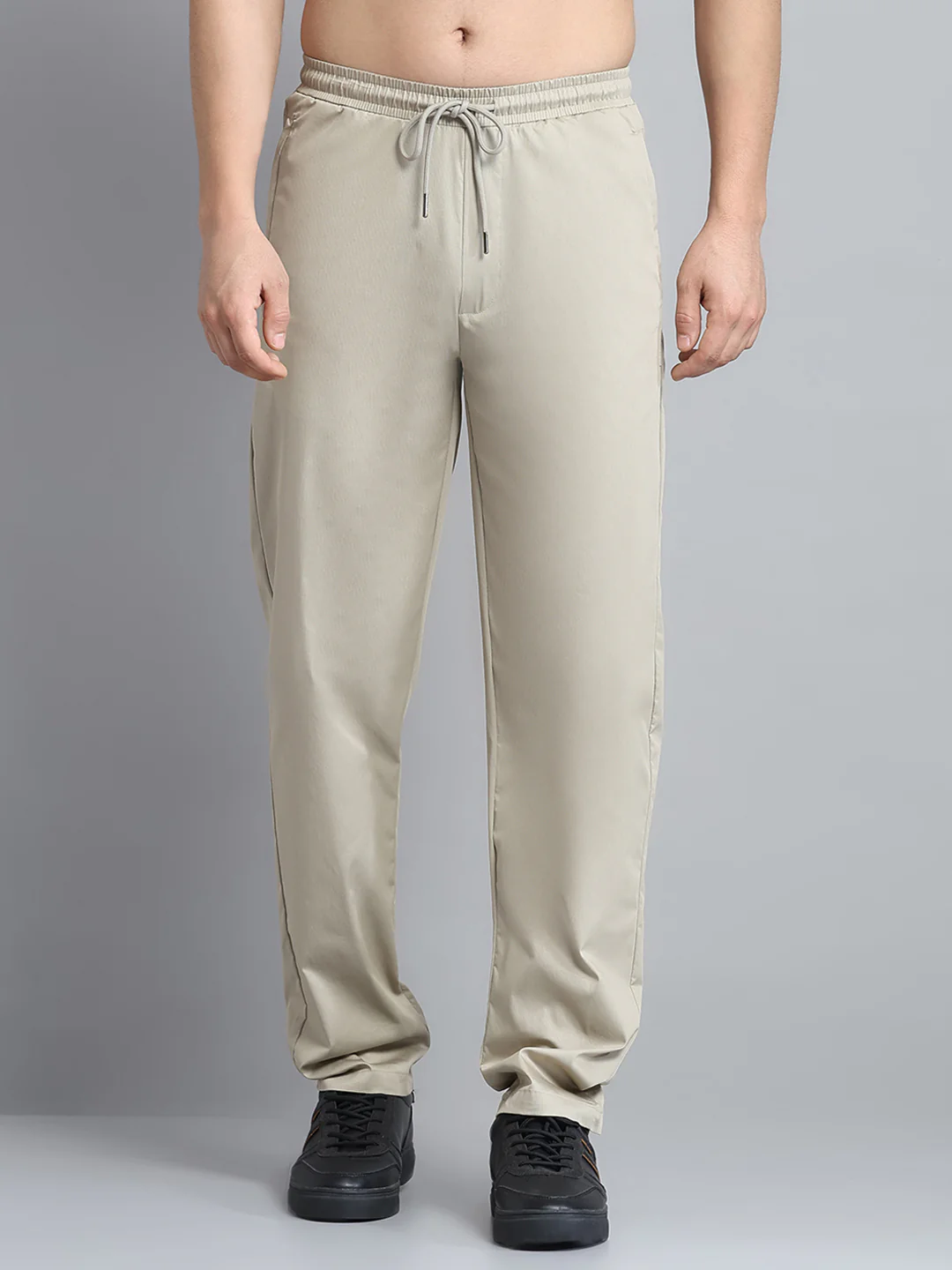 Men Beige Solid Regular Fit Lower