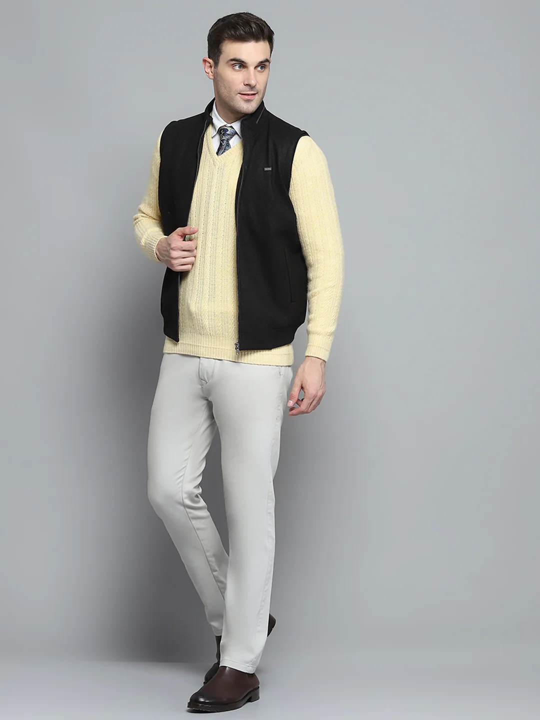 Men Black Solid Mock Neck Sleeveless Jacket - Image 2