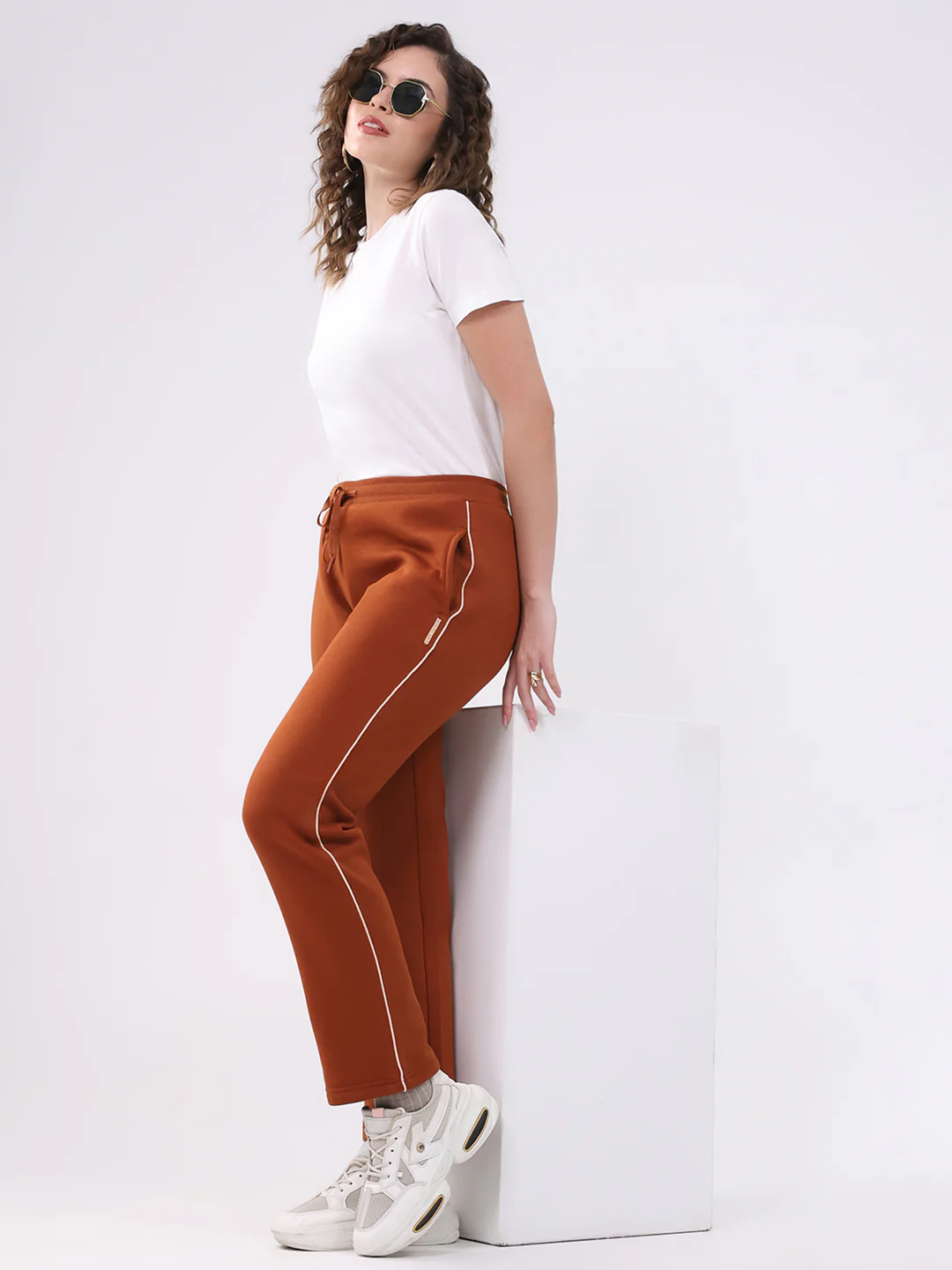 Women Brown Solid Regular Fit Winte Lower - Image 2