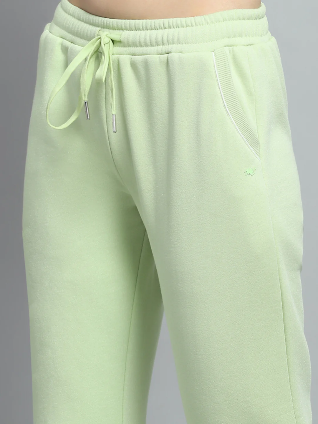 Women Green Solid Hooded Full Sleeve Tracksuit - Image 9