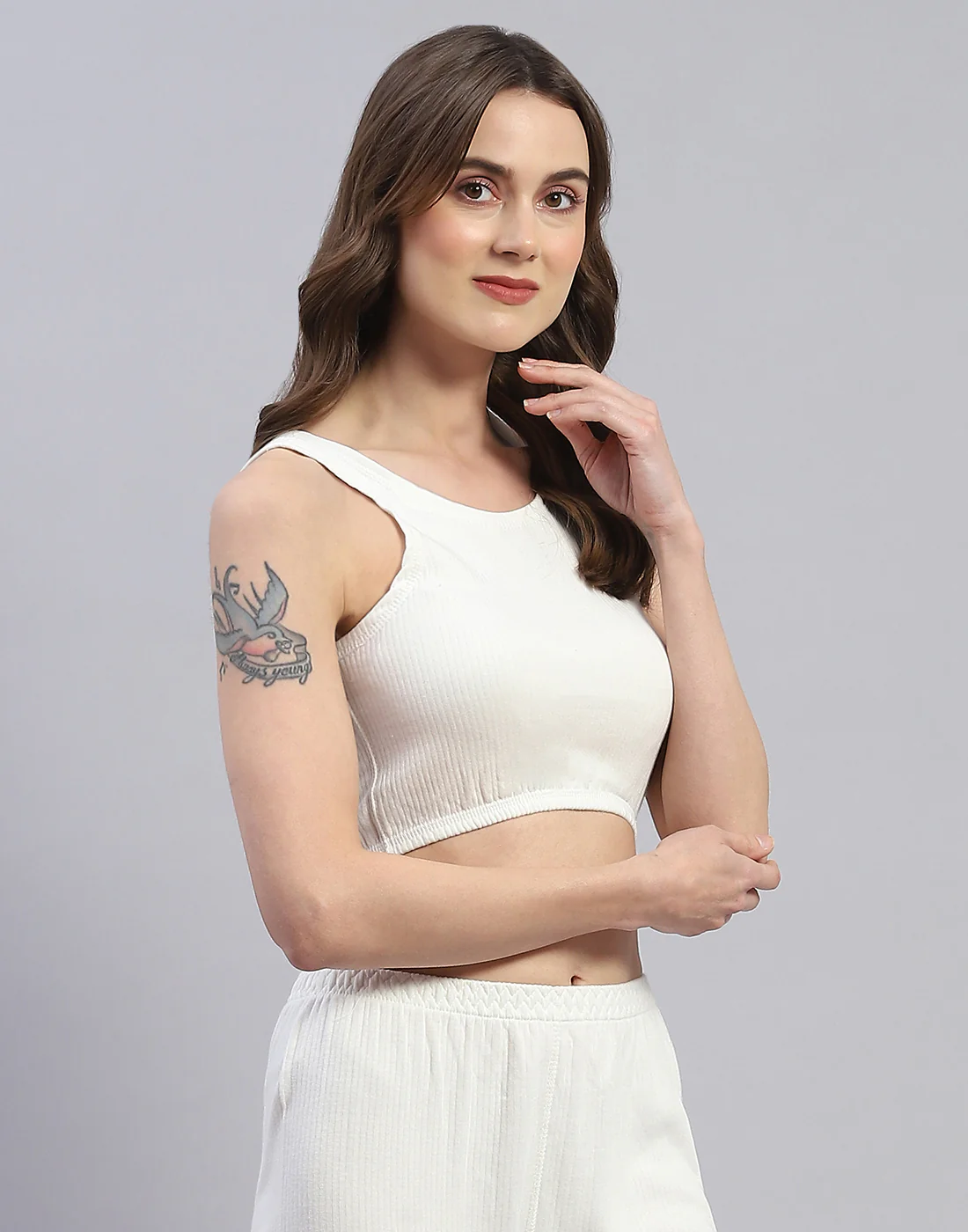 Women Off White Solid Round Neck Sleeveless Thermal Blouse - Image 4